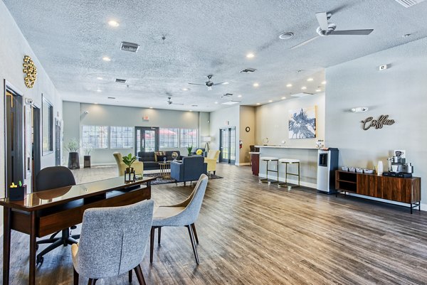 Luxurious clubhouse with contemporary decor and cozy seating at Esteban Park Apartments