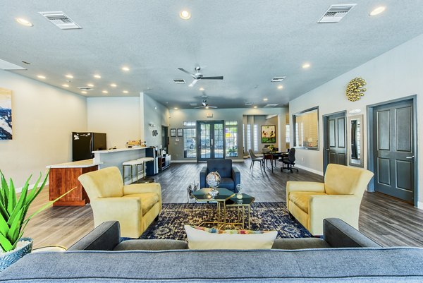 Welcoming clubhouse lobby at Esteban Park Apartments with contemporary furnishings and modern design
