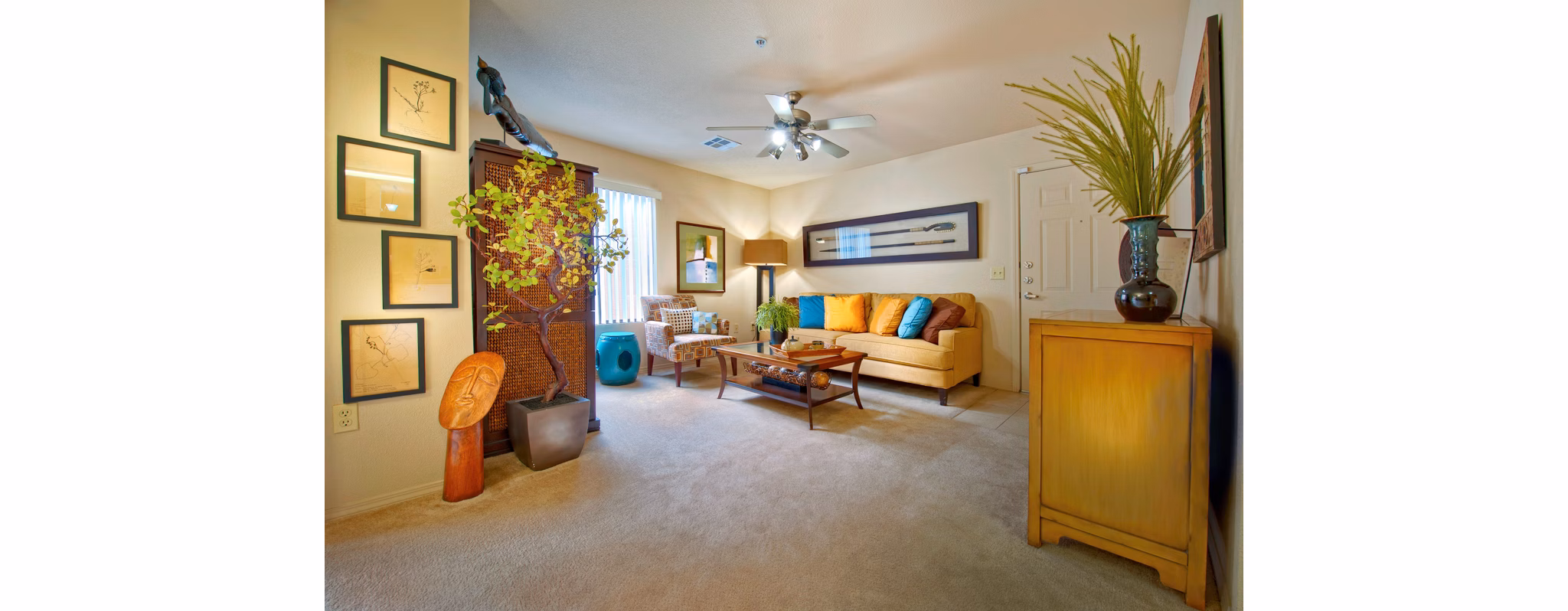 Spacious living room with modern decor at Esteban Park Apartments