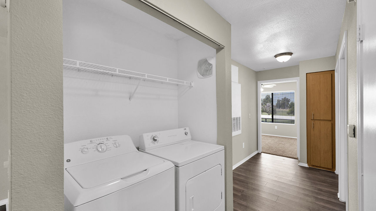 Laundry room at Esteban Park Apartments