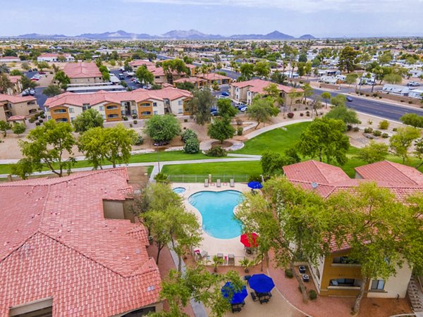 The Colony Apartments: Modern poolside view at luxury apartments in prime location