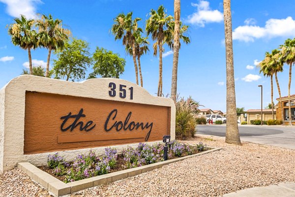 The Colony Apartments signage displaying luxury living in a serene community setting