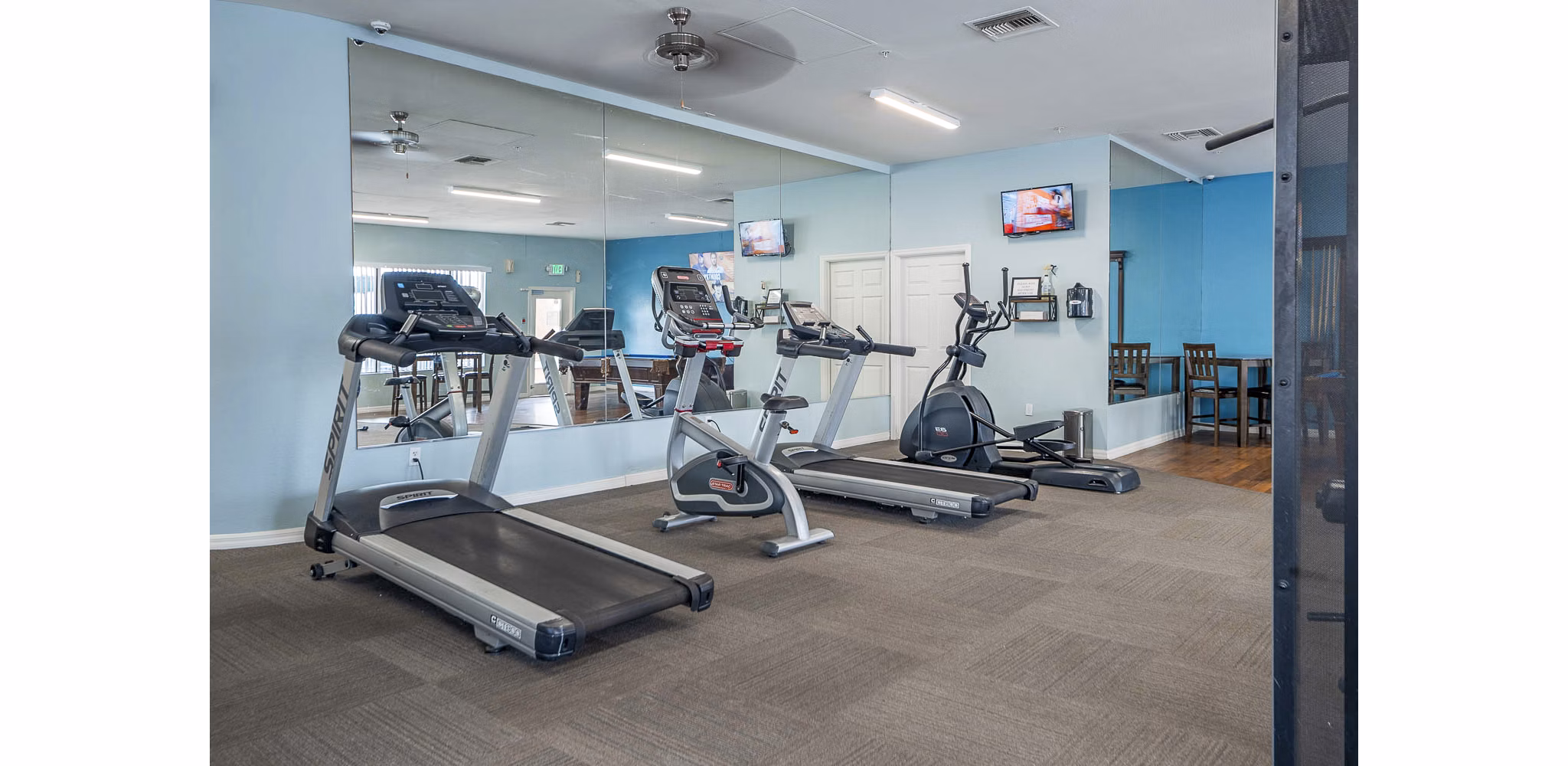 State-of-the-art fitness center with modern equipment at The Colony Apartments