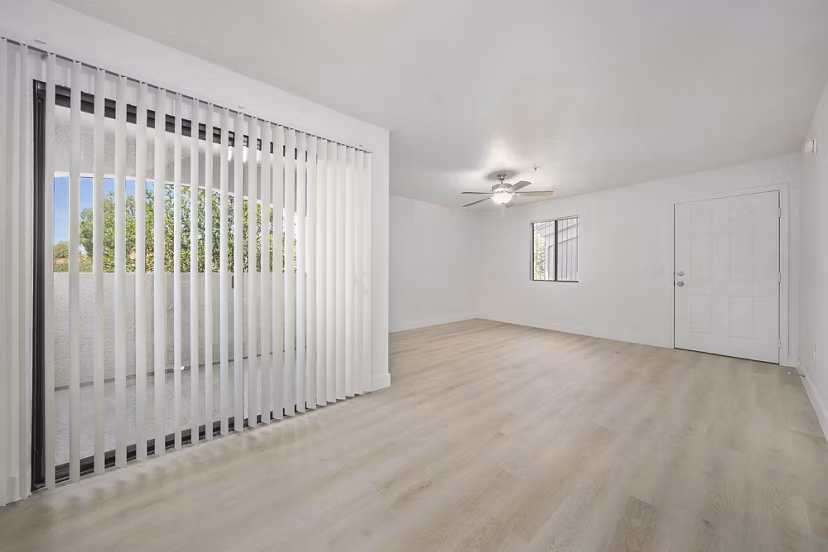 Cozy living room with modern furnishings at The Colony Apartments, a luxury Greystar community