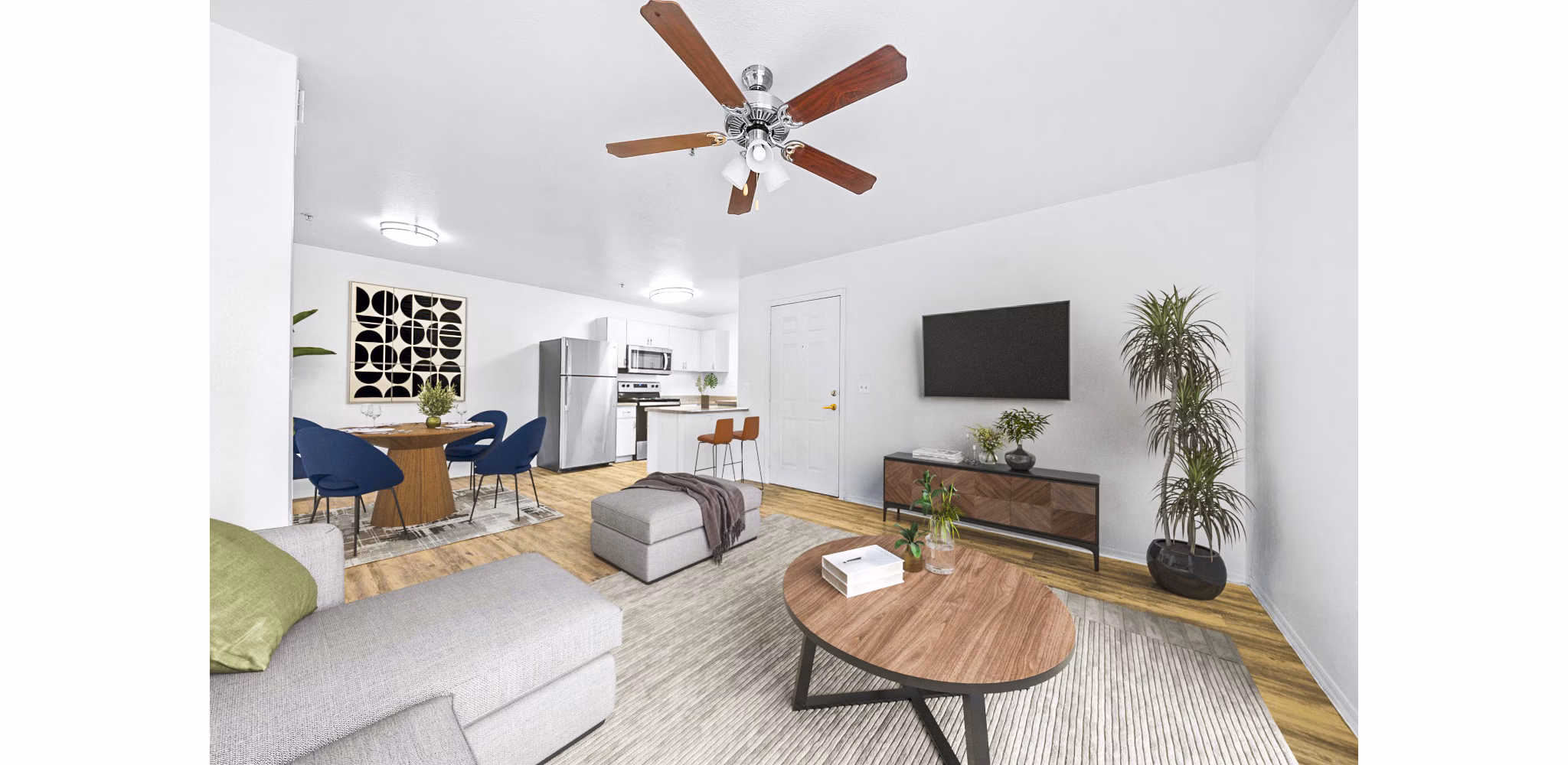 Cozy living room with modern furnishings at The Colony Apartments, a luxury Greystar community