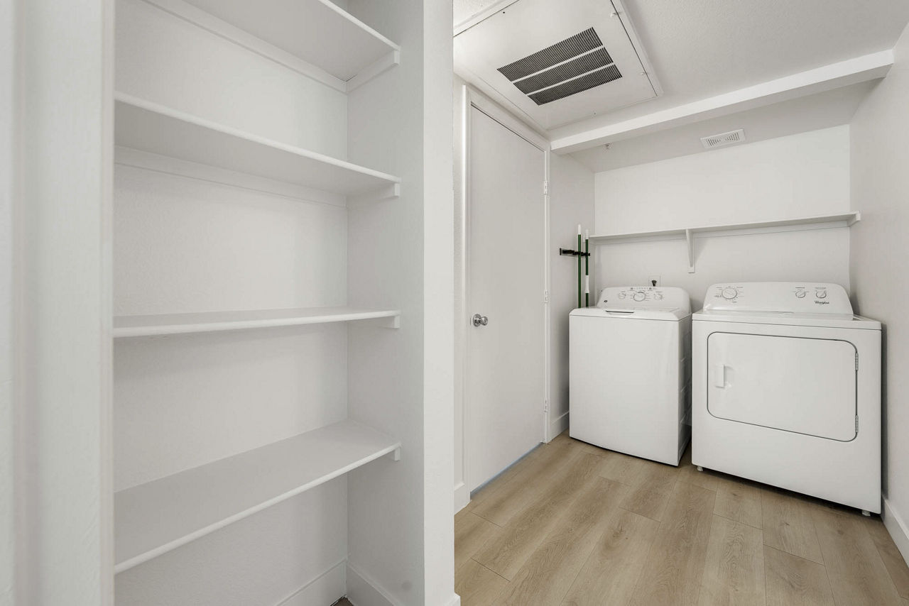 Laundry room at The Colony Apartments