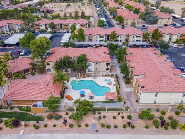 Relaxing pool area with cabanas at The Colony Apartments, luxury community living