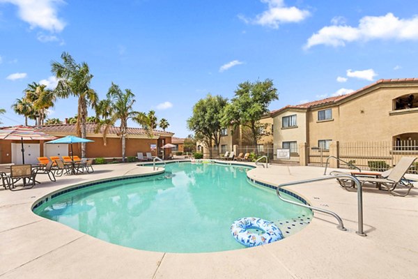 Infinity-edge pool at The Colony Apartments offering a luxury oasis for residents