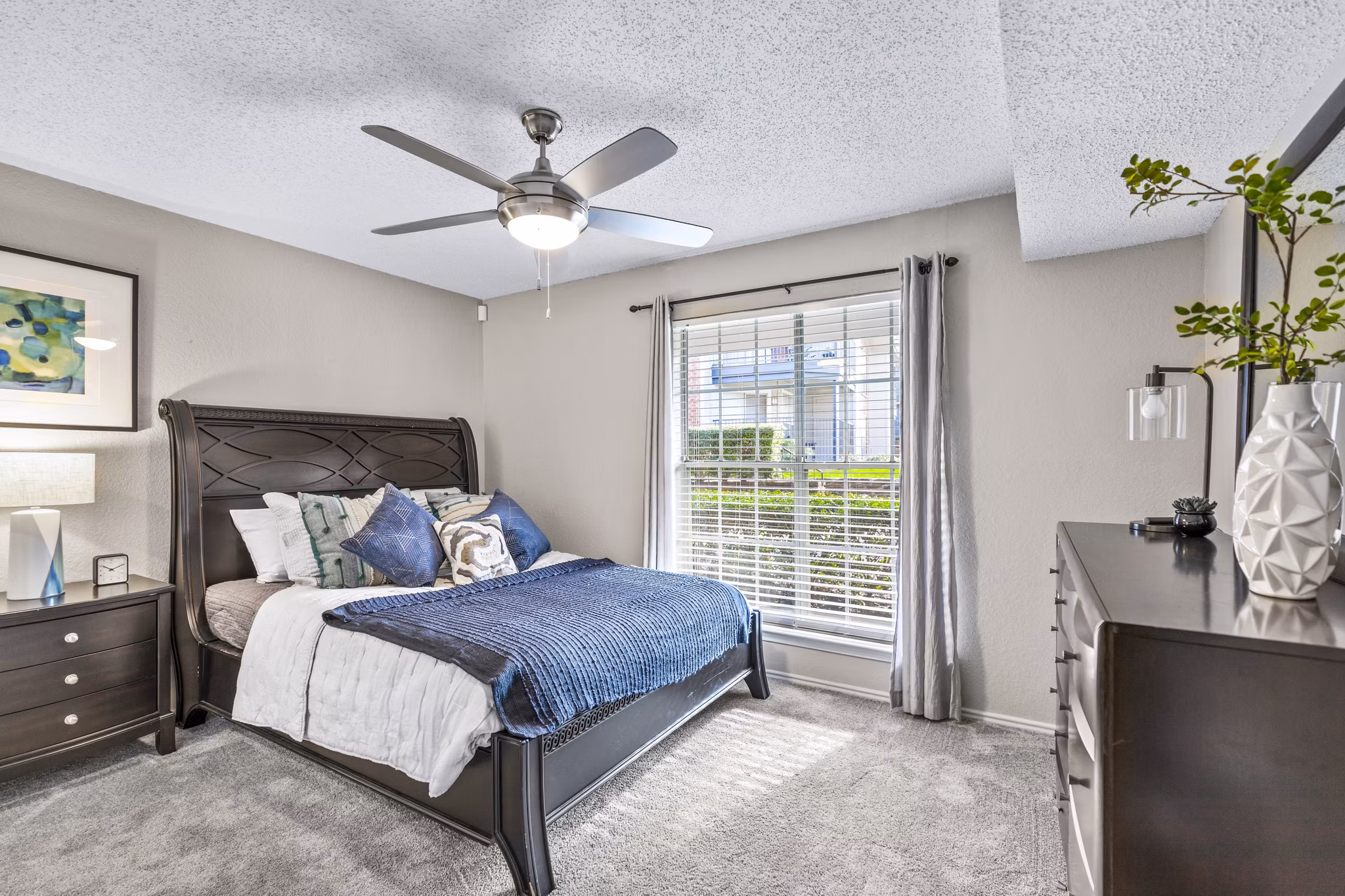 Elegant bedroom with modern furnishings at The Georgian Apartments