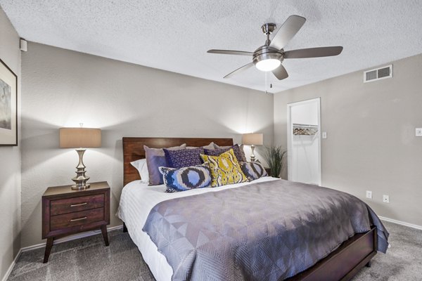 Elegant bedroom with soft lighting and modern decor in The Georgian Apartments, offering luxury living