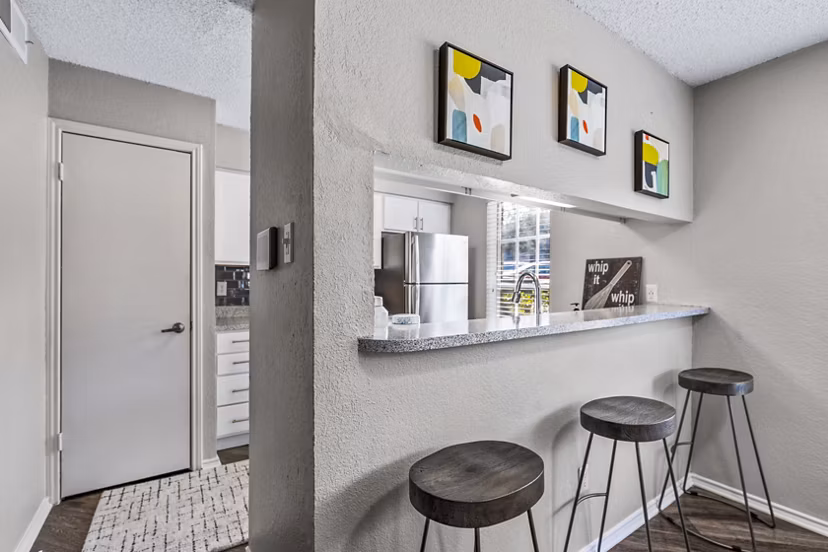 The Georgian Apartments: Elegant dining room with contemporary design featuring luxury finishes