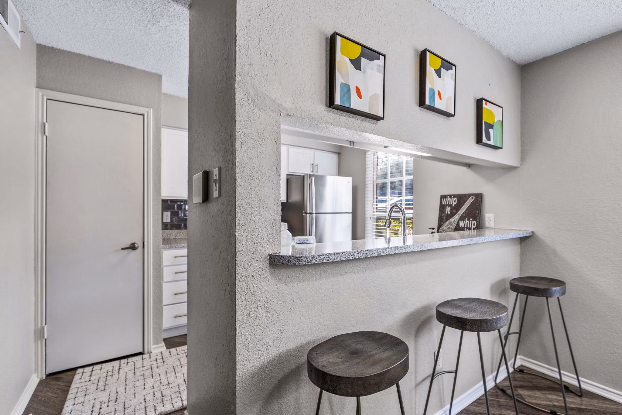 The Georgian Apartments: Elegant dining room with contemporary design featuring luxury finishes