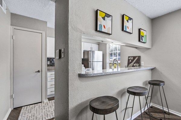 The Georgian Apartments: Elegant dining room with contemporary design featuring luxury finishes