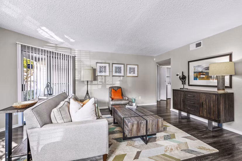 Spacious living room with modern decor in The Georgian Apartments