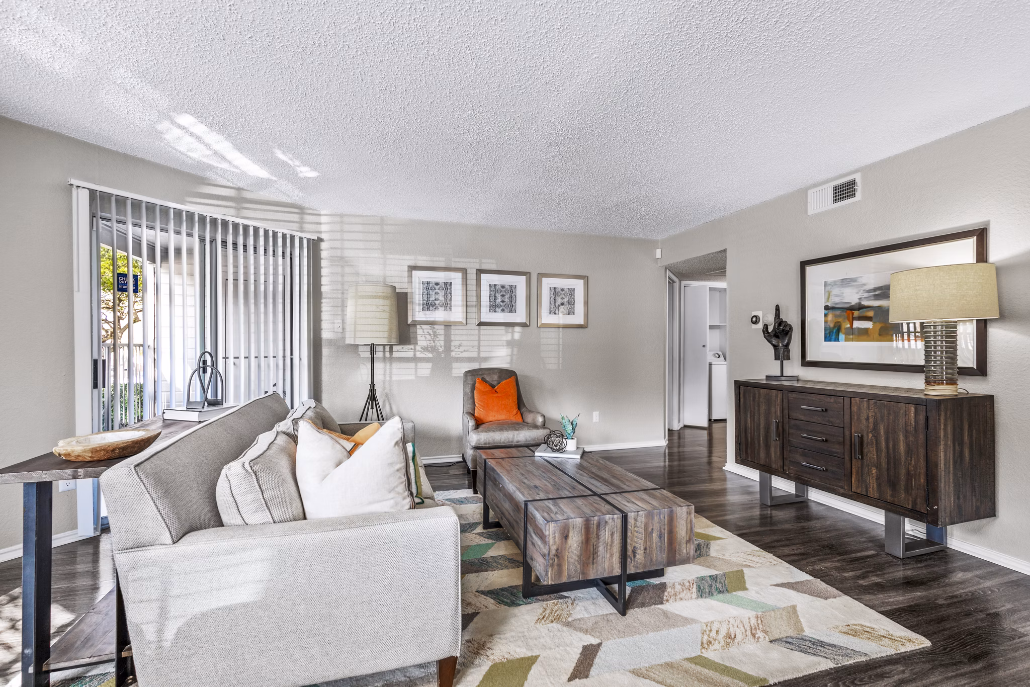 Spacious living room with modern decor in The Georgian Apartments