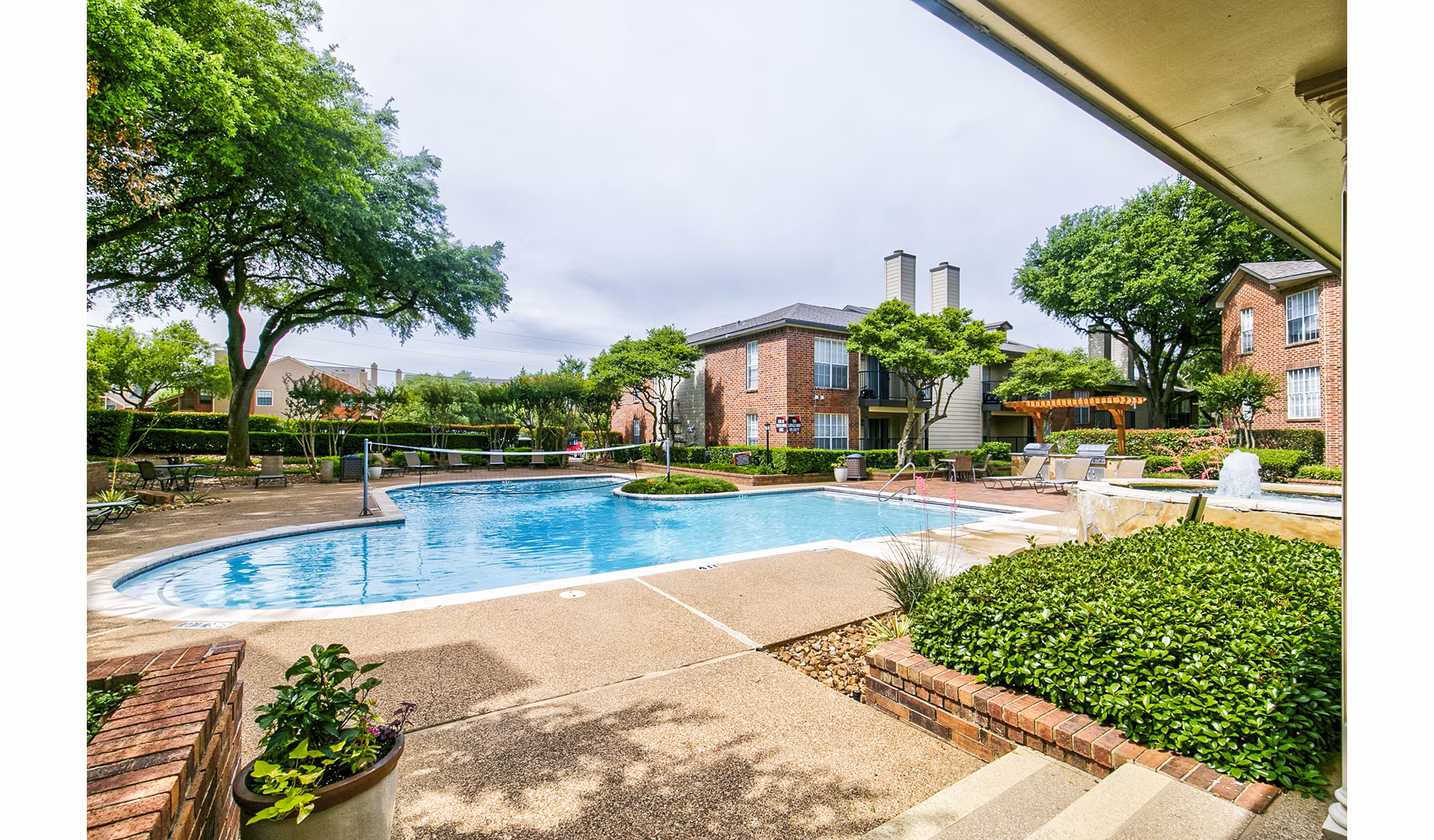 Rooftop pool with city views at The Georgian Apartments