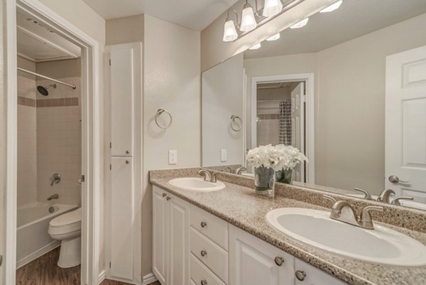 Bathroom featuring modern fixtures and sleek design at Regal Parc Apartments