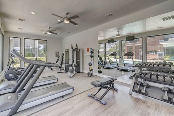 State-of-the-art fitness center at Regal Parc Apartments with modern gym equipment and workout areas