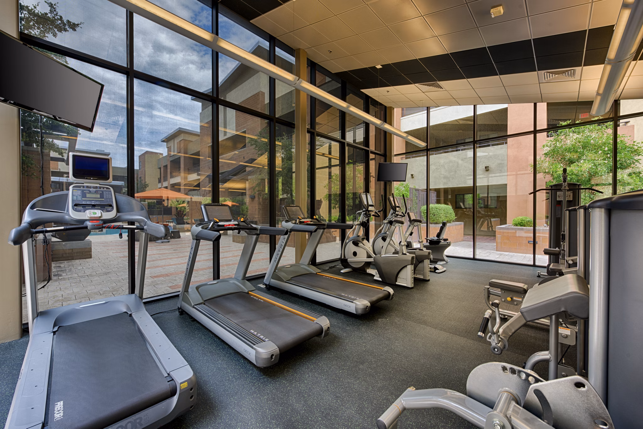 State-of-the-art fitness center with modern equipment at Ten Wine Lofts Apartments