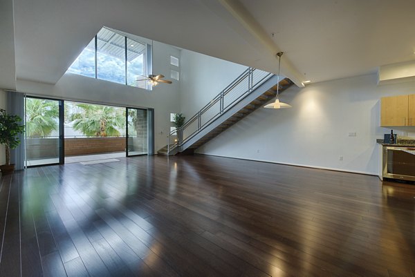 Spacious living room with modern furnishings at Ten Wine Lofts Apartments, Greystar luxury apartments in Scottsdale