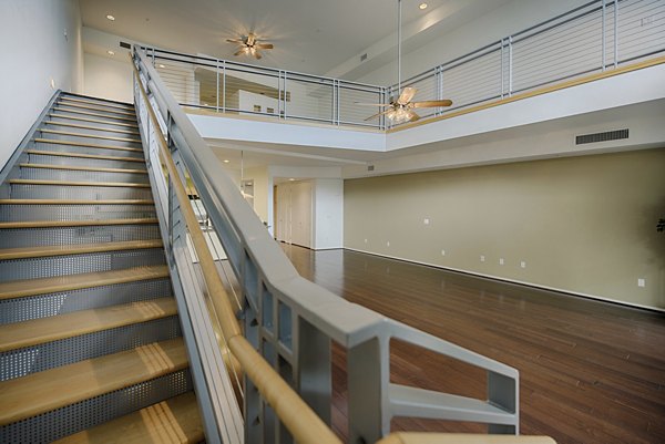 Chic living room with modern decor at Ten Wine Lofts Apartments featuring stylish furnishings and ample natural light