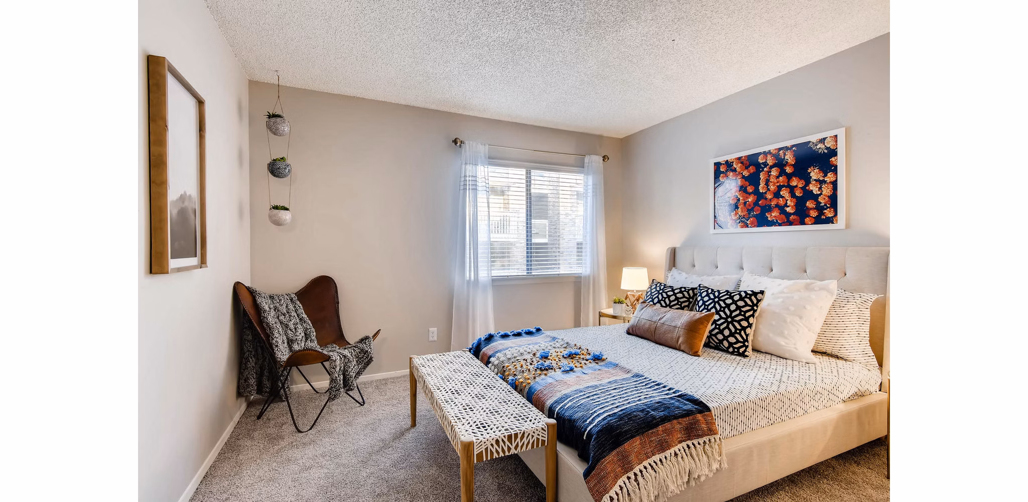 Elegant bedroom with modern dÃ©cor at Canyon Reserve at the Ranch Apartments