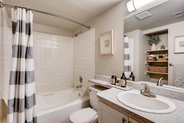 Modern bathroom with sleek fixtures at Canyon Reserve at the Ranch Apartments, providing luxury living spaces for residents