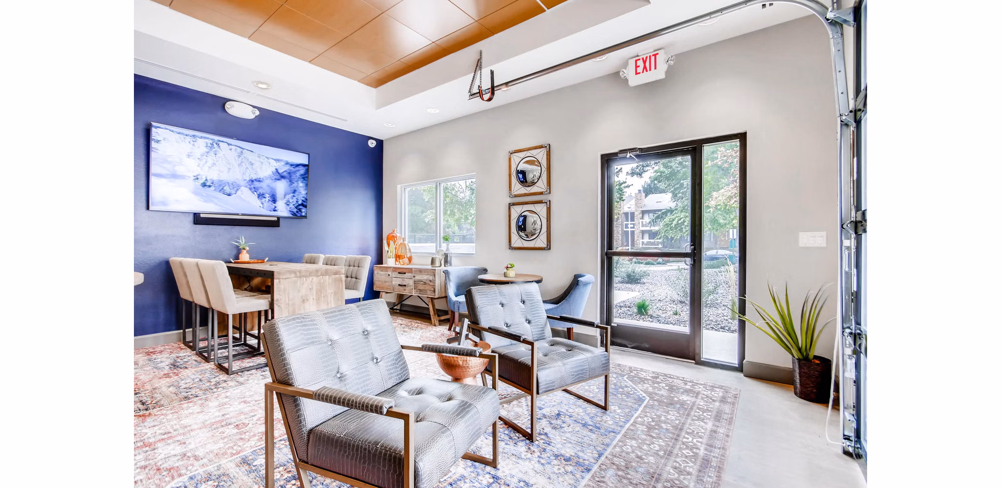 Clubhouse featuring modern design and comfortable seating at Canyon Reserve at the Ranch Apartments