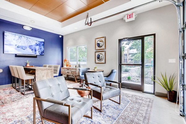 Clubhouse featuring modern design and comfortable seating at Canyon Reserve at the Ranch Apartments