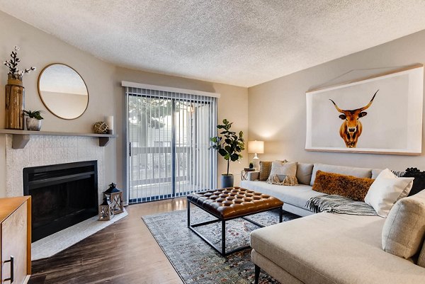 Spacious living room with modern decor in Canyon Reserve at the Ranch Apartments
