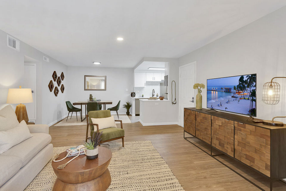 Spacious living room with modern decor in Canyon Reserve at the Ranch Apartments