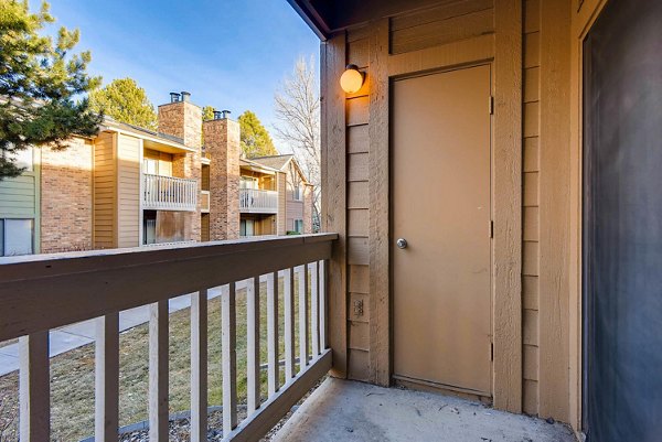 Patio with modern seating and mountain views at Canyon Reserve at the Ranch Apartments