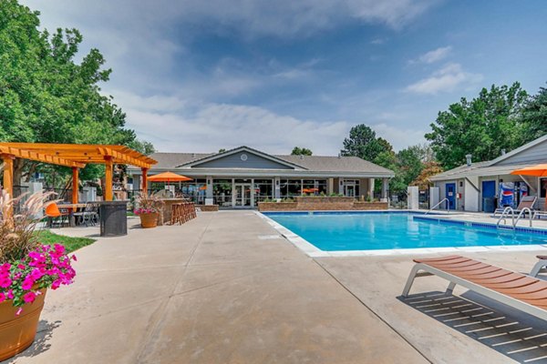 Inviting pool with lounge chairs at Canyon Reserve at the Ranch Apartments, perfect for relaxation and leisure