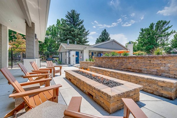 Fire pit surrounded by cozy seating at Canyon Reserve at the Ranch Apartments, perfect for outdoor relaxation and gatherings