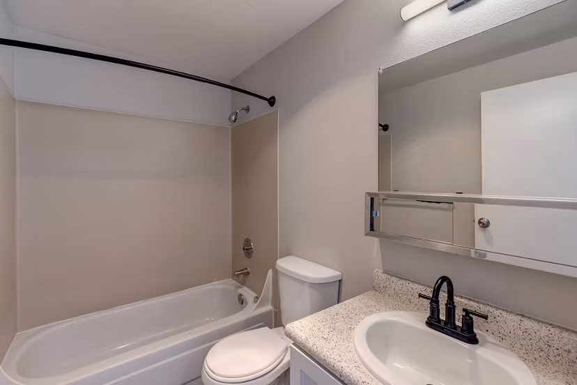 Elegant bathroom with modern fixtures at Avana Star Lake Apartments