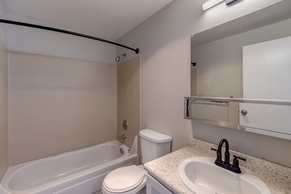 Elegant bathroom with modern fixtures at Avana Star Lake Apartments
