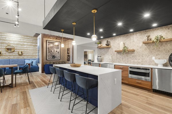 Clubhouse featuring modern interiors and community space at Avana Star Lake Apartments