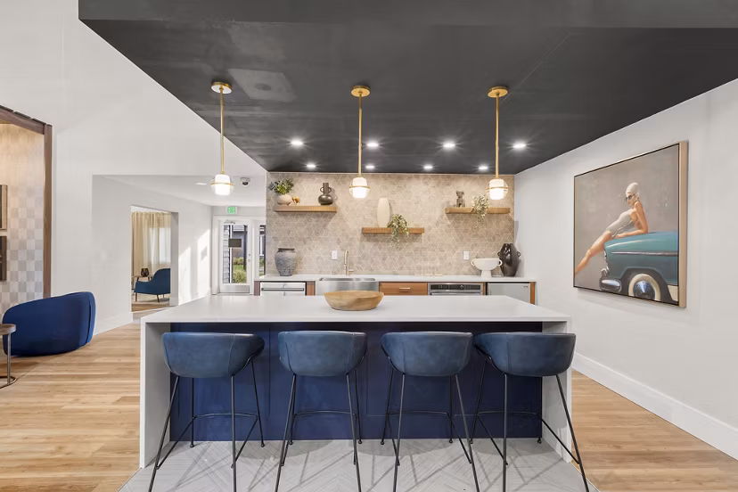 Clubhouse with modern furnishings at Avana Star Lake Apartments, perfect for socializing and community events