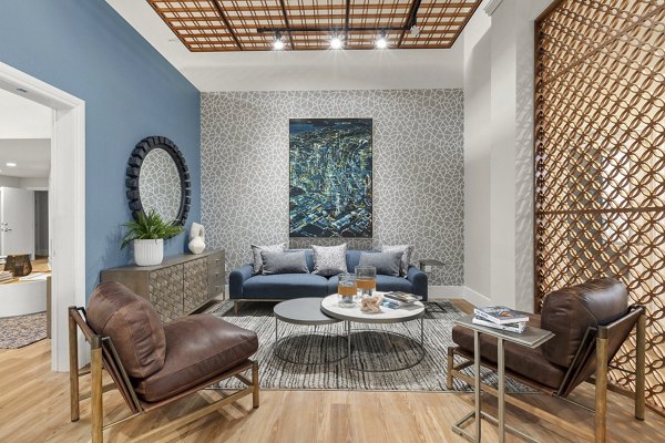 Spacious clubhouse with modern seating and decor at Avana Star Lake Apartments
