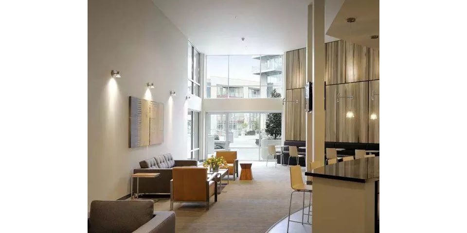 Clubhouse at On the Park Apartments featuring modern design and comfortable seating spaces for residents to enjoy