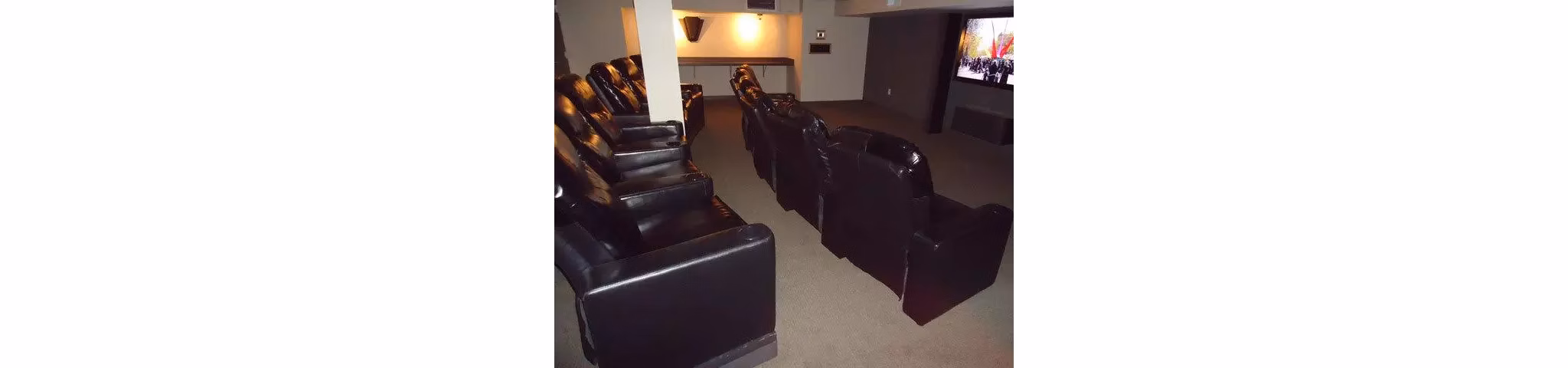 Theater featuring luxury seating and surround sound at On the Park Apartments