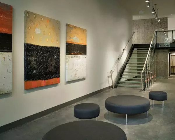 Clubhouse featuring modern decor and open seating at On the Park Apartments, perfect for social gatherings and community events