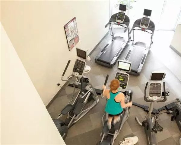 fitness center at On the Park Apartments