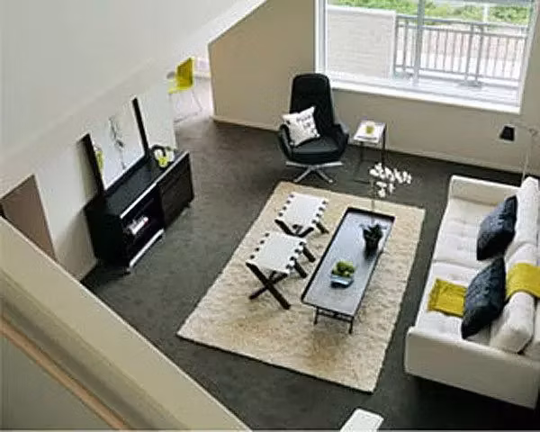 Contemporary living room with modern decor at On the Park Apartments
