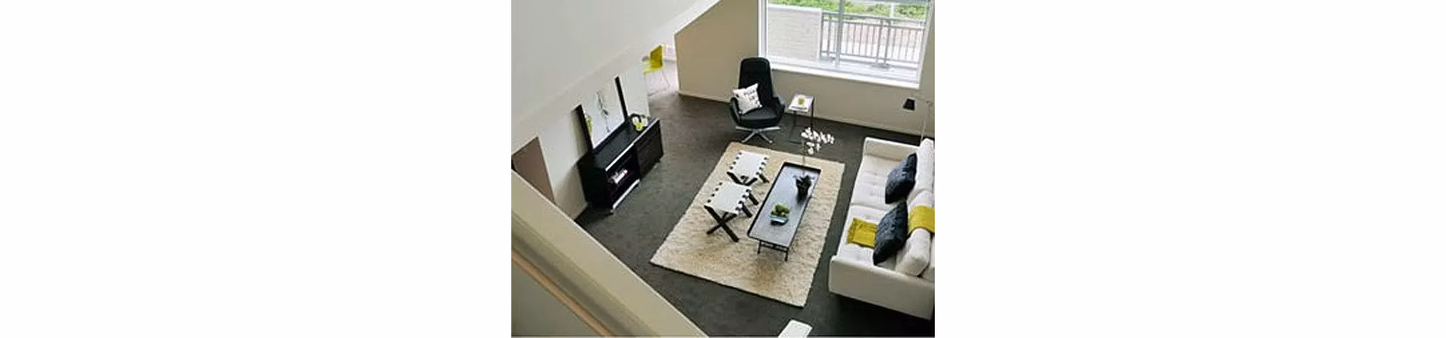 Contemporary living room with modern decor at On the Park Apartments