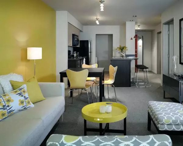 Bright living room with modern furnishings at On the Park Apartments, featuring luxury interiors and spacious design