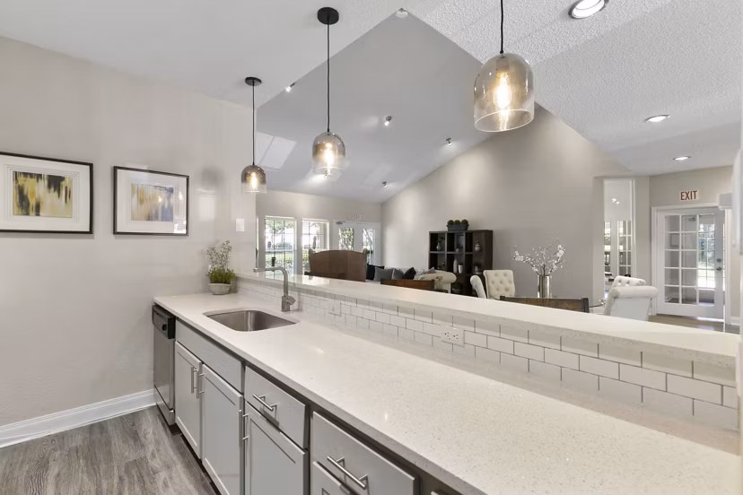 Creekwood Apartments: Elegant clubhouse featuring modern furnishings and open spaces, ideal for gatherings and relaxation