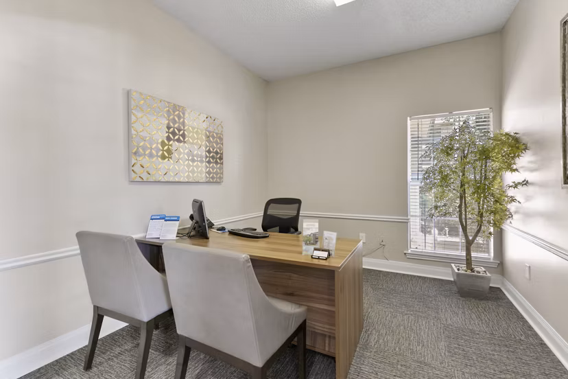 Clubhouse featuring modern design elements at Creekwood Apartments, ideal for community events and gatherings