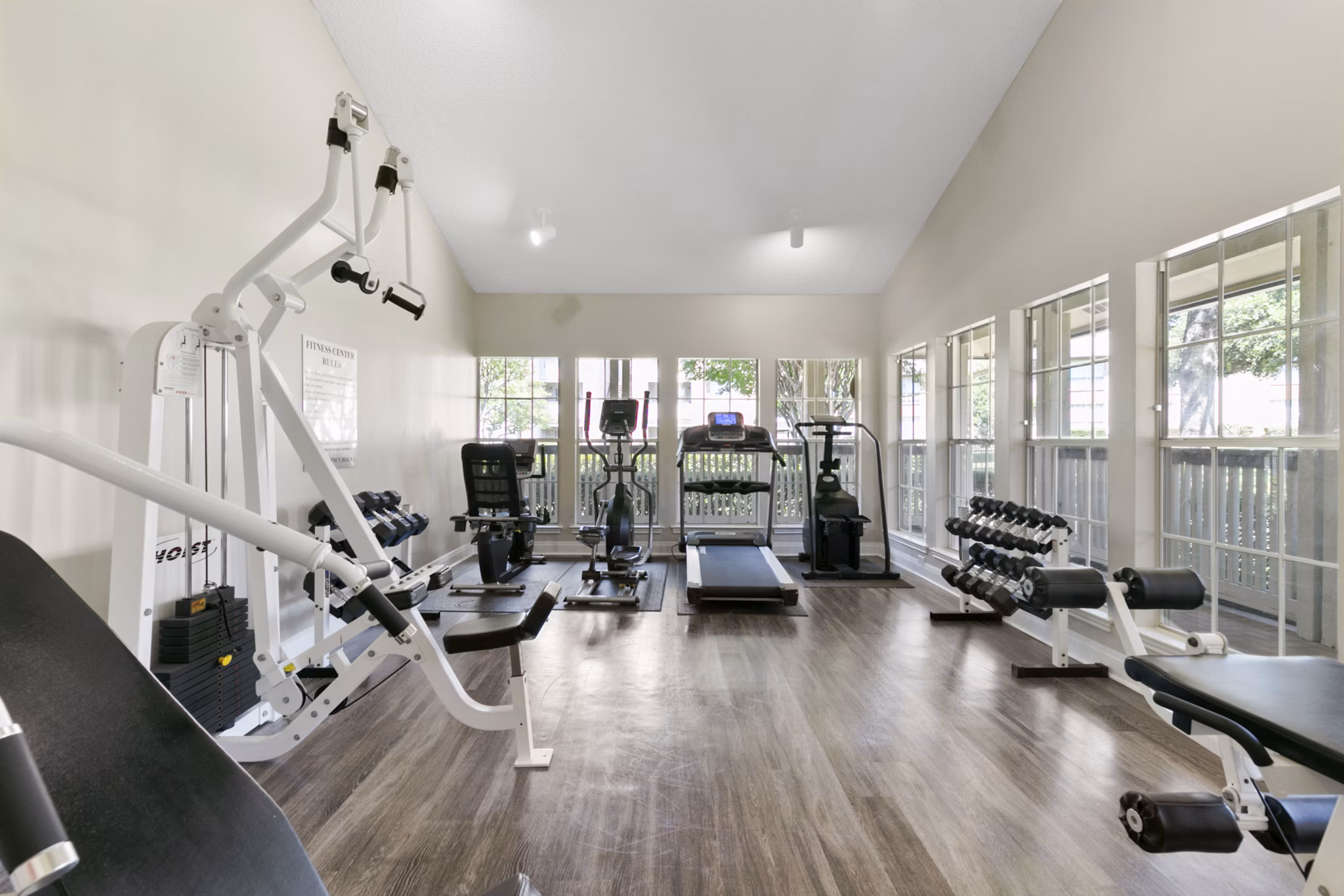 State-of-the-art fitness center with modern equipment in Creekwood Apartments