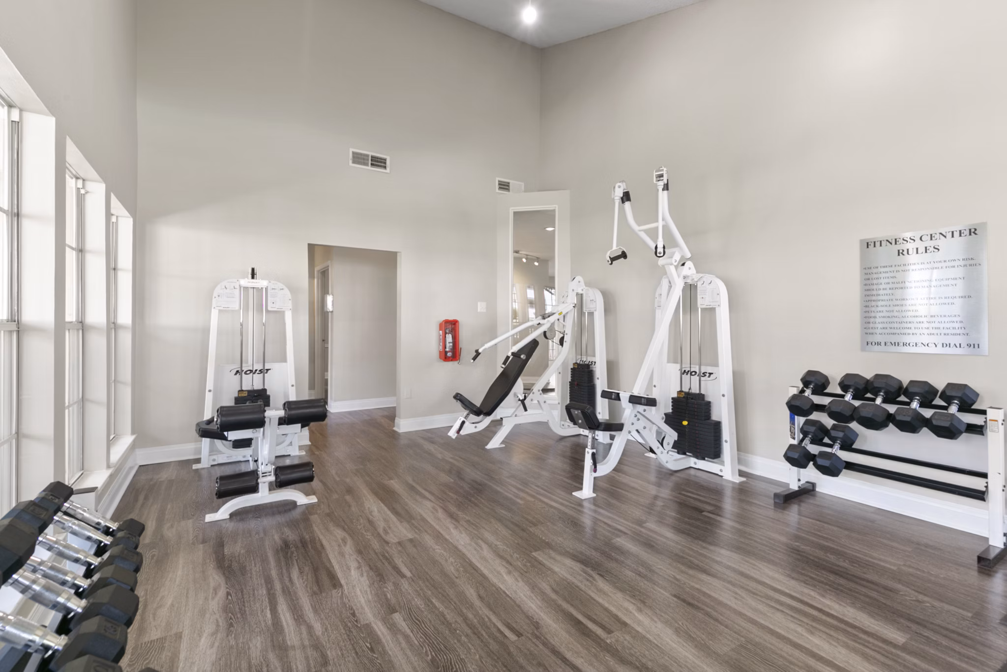 State-of-the-art fitness center with modern equipment at Creekwood Apartments offering luxury living and wellness amenities